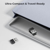 Small USB device with a compact travel case on a light gray background
